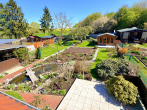 Außenansicht Garten0 - Gepflegte Doppelhaushälfte mit blühenden Garten und zwei Garagen