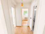 Flur - Ruhige 3-Zimmer-Wohnung auf Erbpacht mit Südwestbalkon im Lübecker Musikerviertel