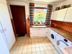 EG Wäscheraum - Einfamilienhaus auf Eigenland in Moisling/Niendorf mit Wintergarten, Doppelgarage und großem Garten