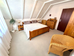 OG Schlafzimmer - Einfamilienhaus auf Eigenland in Moisling/Niendorf mit Wintergarten, Doppelgarage und großem Garten