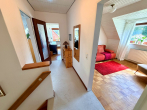OG Flur - Einfamilienhaus auf Eigenland in Moisling/Niendorf mit Wintergarten, Doppelgarage und großem Garten