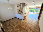 EG Wohnzimmer - Naturnaher Lage von St. Jürgen: Gepflegtes Reihenmittelhaus mit Garage & zwei Räumen als Nutzfläche