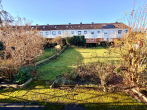 Außenansicht Garten - Reihenmittelhaus mit sonnigem Garten und Ausbaupotenzial im Dachboden auf Erbpacht